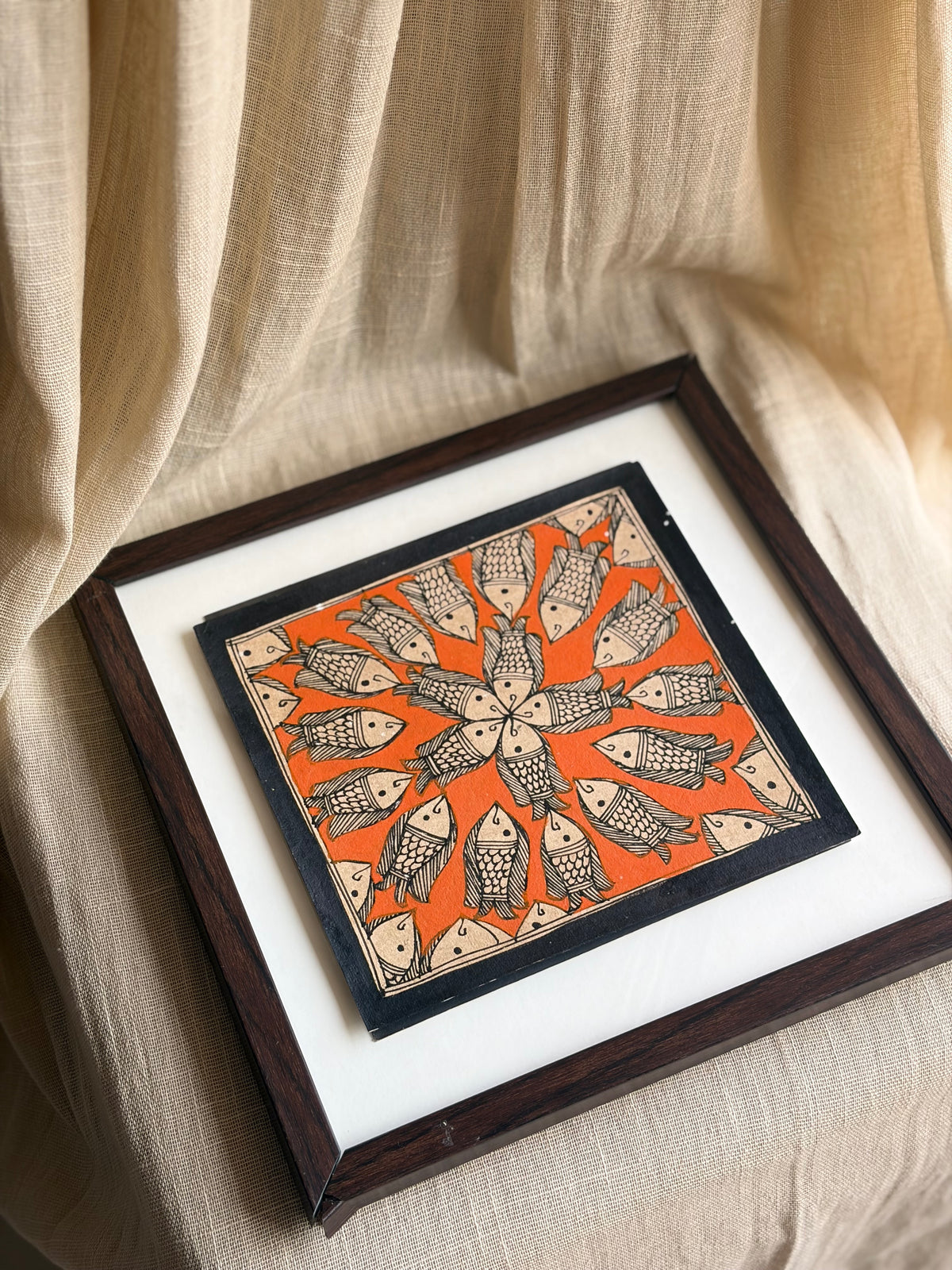 Original Madhubani Orange spiral fish- Framed