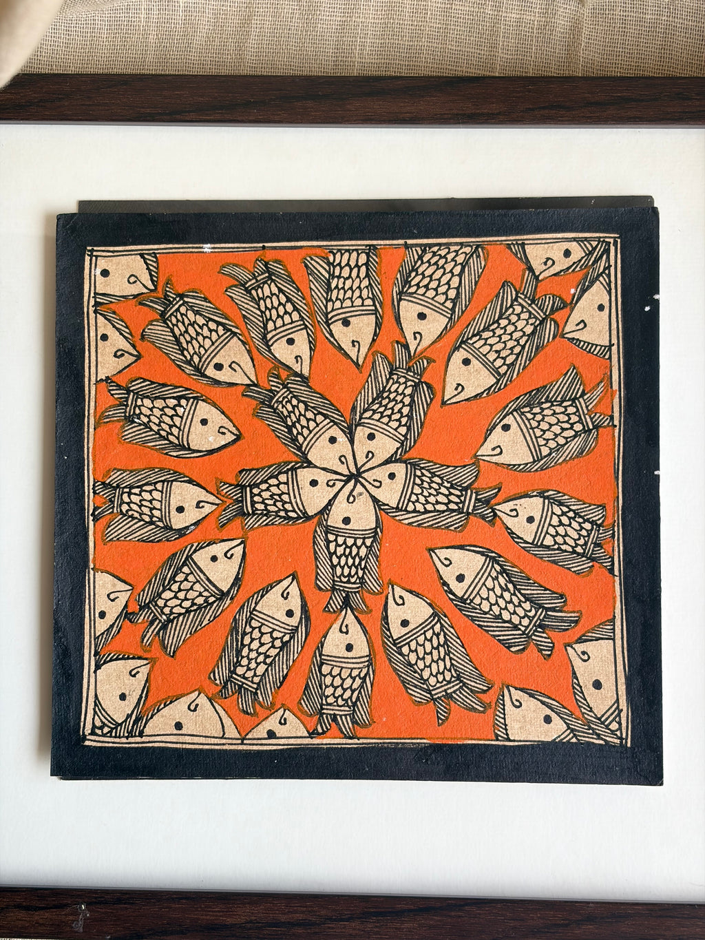 Original Madhubani Orange spiral fish- Framed