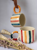 Colourful striped mug, colourful handle