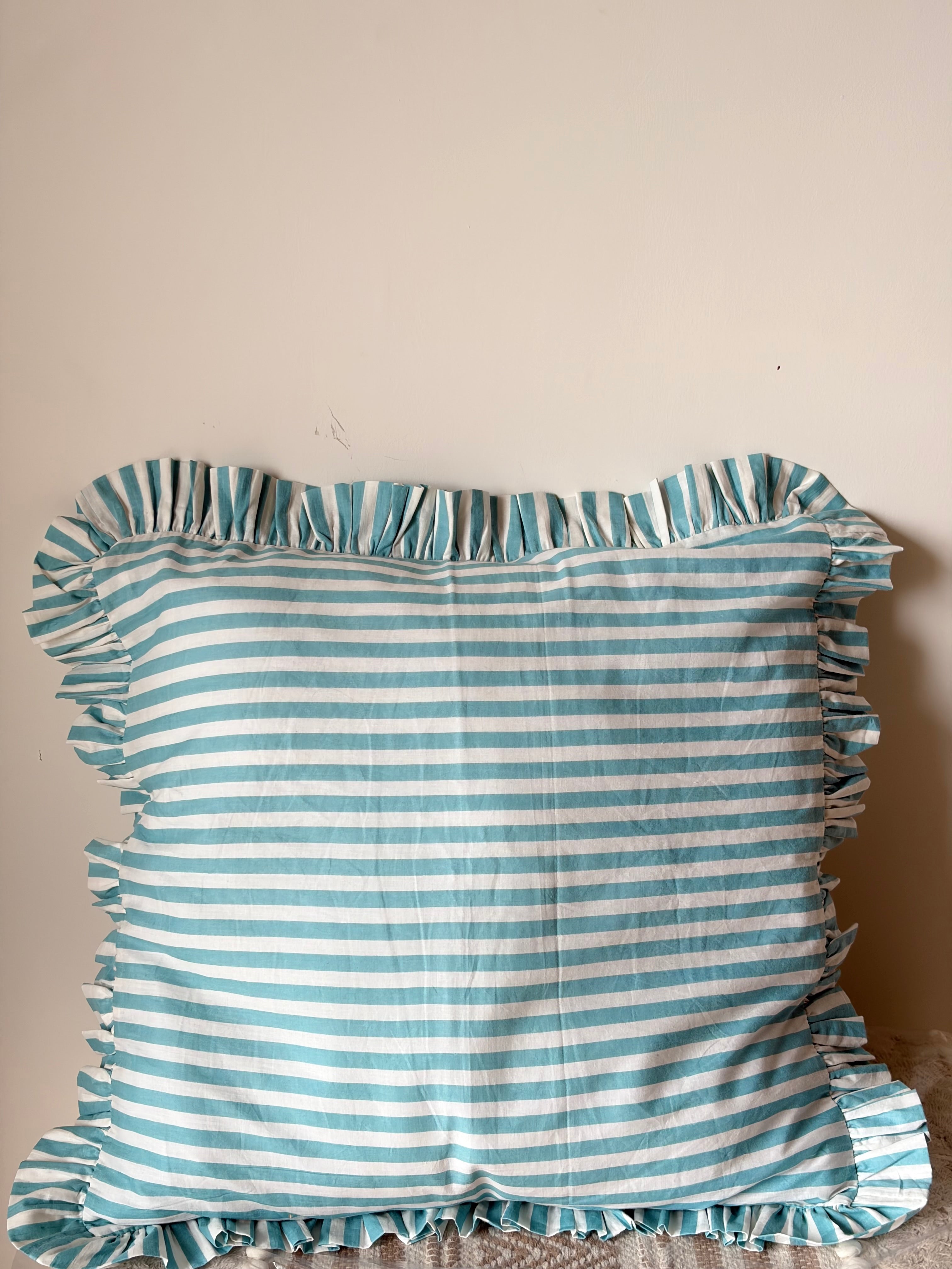 Blue striped cushion cover
