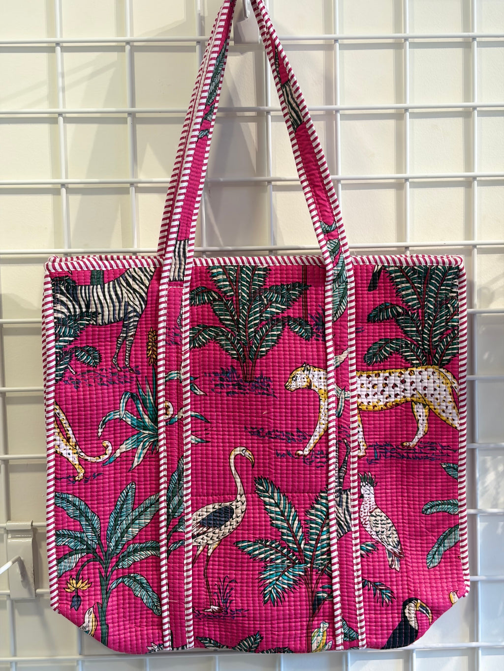 Pink tote with animal plant print