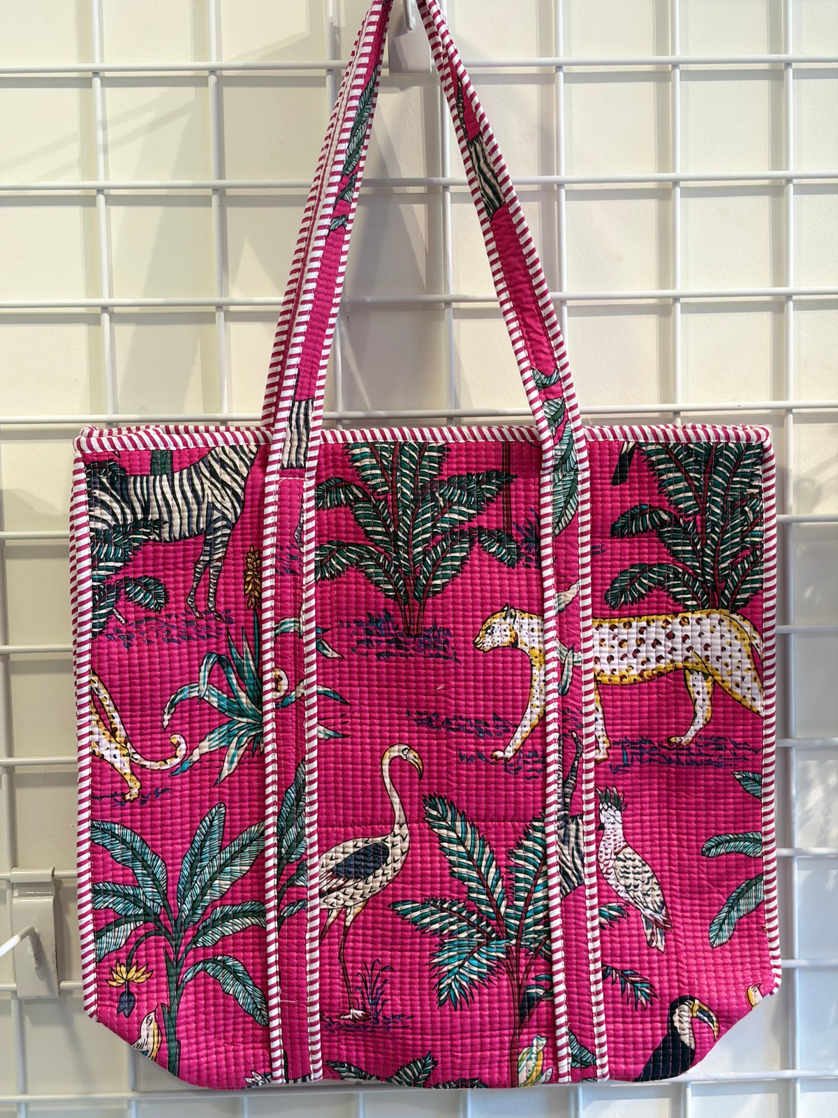 Pink tote with animal plant print